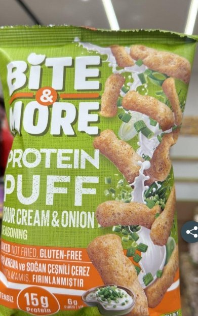 شيبس بمبا عالي البروتين بنكهة الكريمة الحامضة والبصل Bite & More Protein Puff وزنه 50 غرام